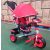 Baby Mix Lux Trike tříkolka s rukojetí a opěrkou na nohy v červené barvě (s hracím ovládacím panelem a světly)